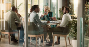 Group, people and talking at meeting in office for project, teamwork and investment banker.