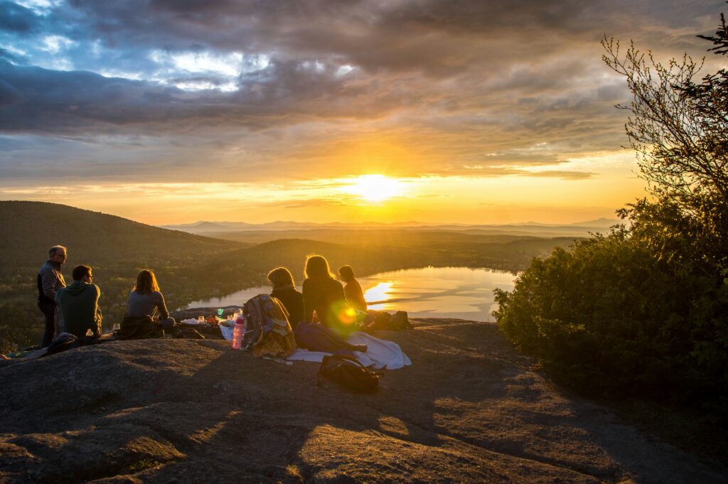 multigenerational family watching sunset